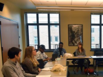 Sara Colleton (far right) listens to pitches from Thornton's SAC 411 class, Writing for TV Pilots